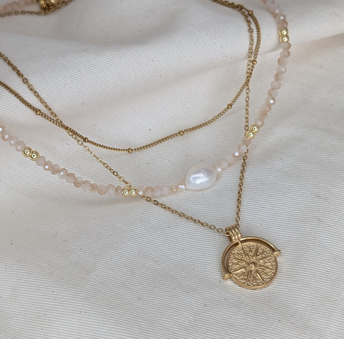 GOLDEN SUN MEDALLION