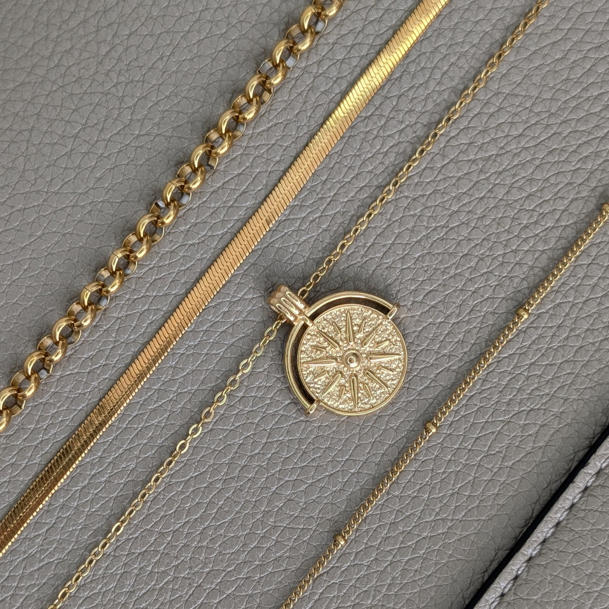 GOLDEN SUN MEDALLION