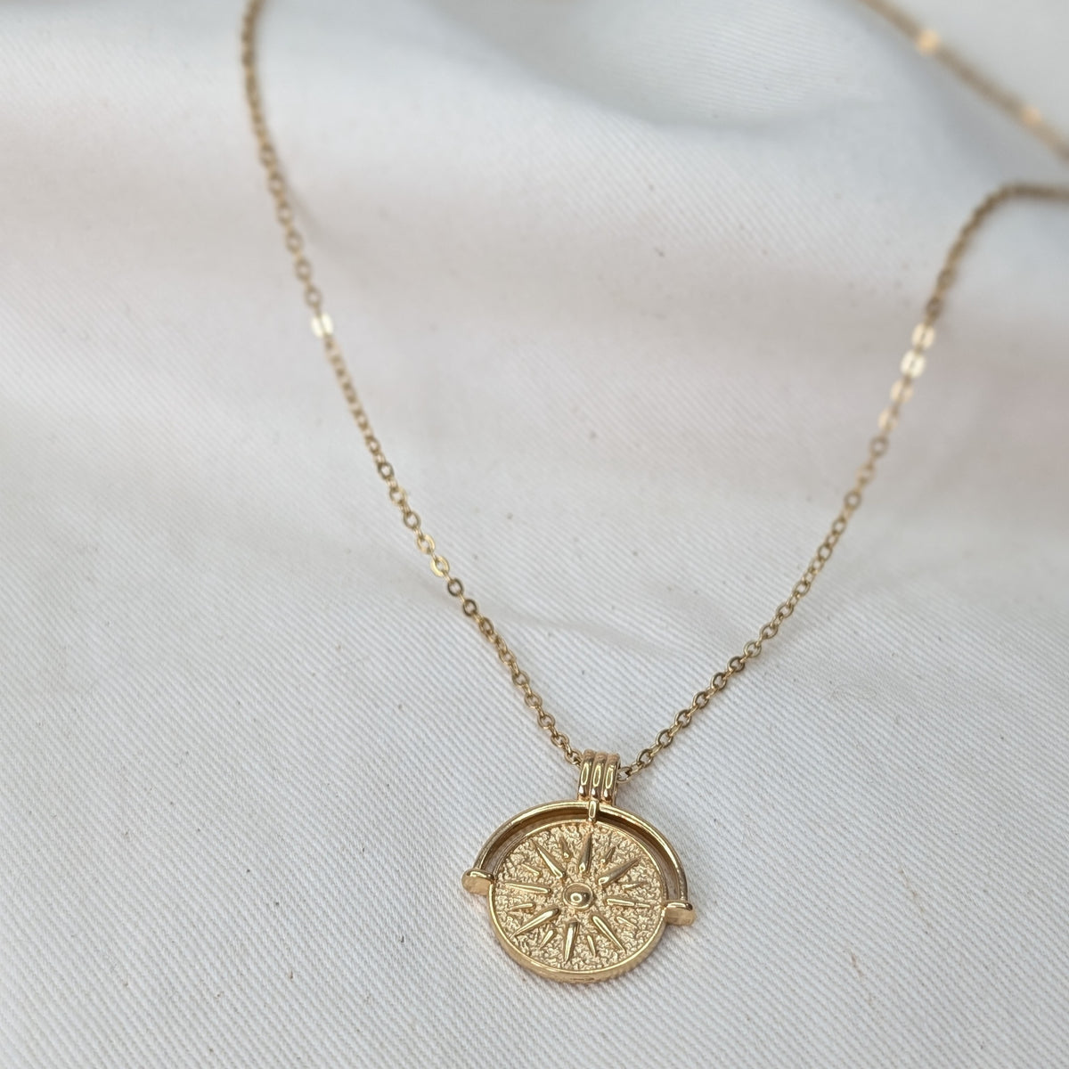 GOLDEN SUN MEDALLION