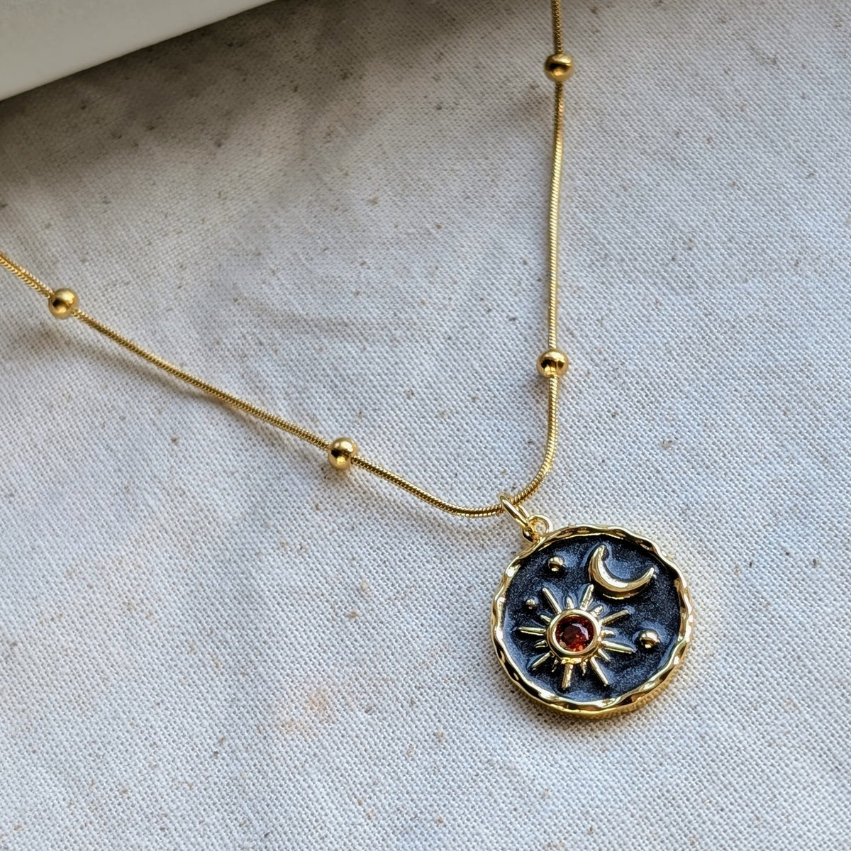 SOLAR ECLIPSE PENDANT NECKLACE